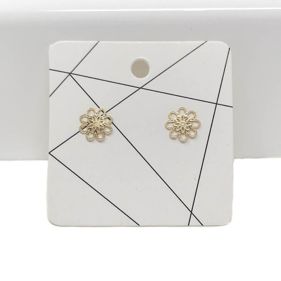 Jewelry - Tiny delicate gold toned flower stud earrings
